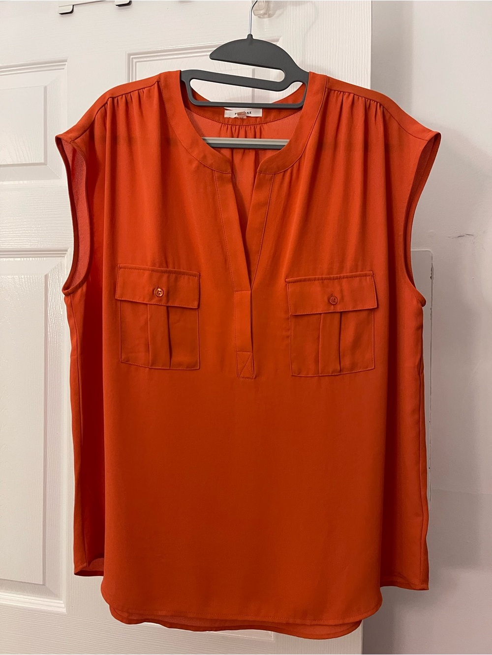 Pleione Sleeveless Split-Neck Blouse in Orange